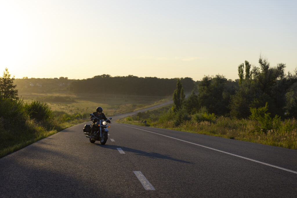long-shot-man-riding-motorbike
